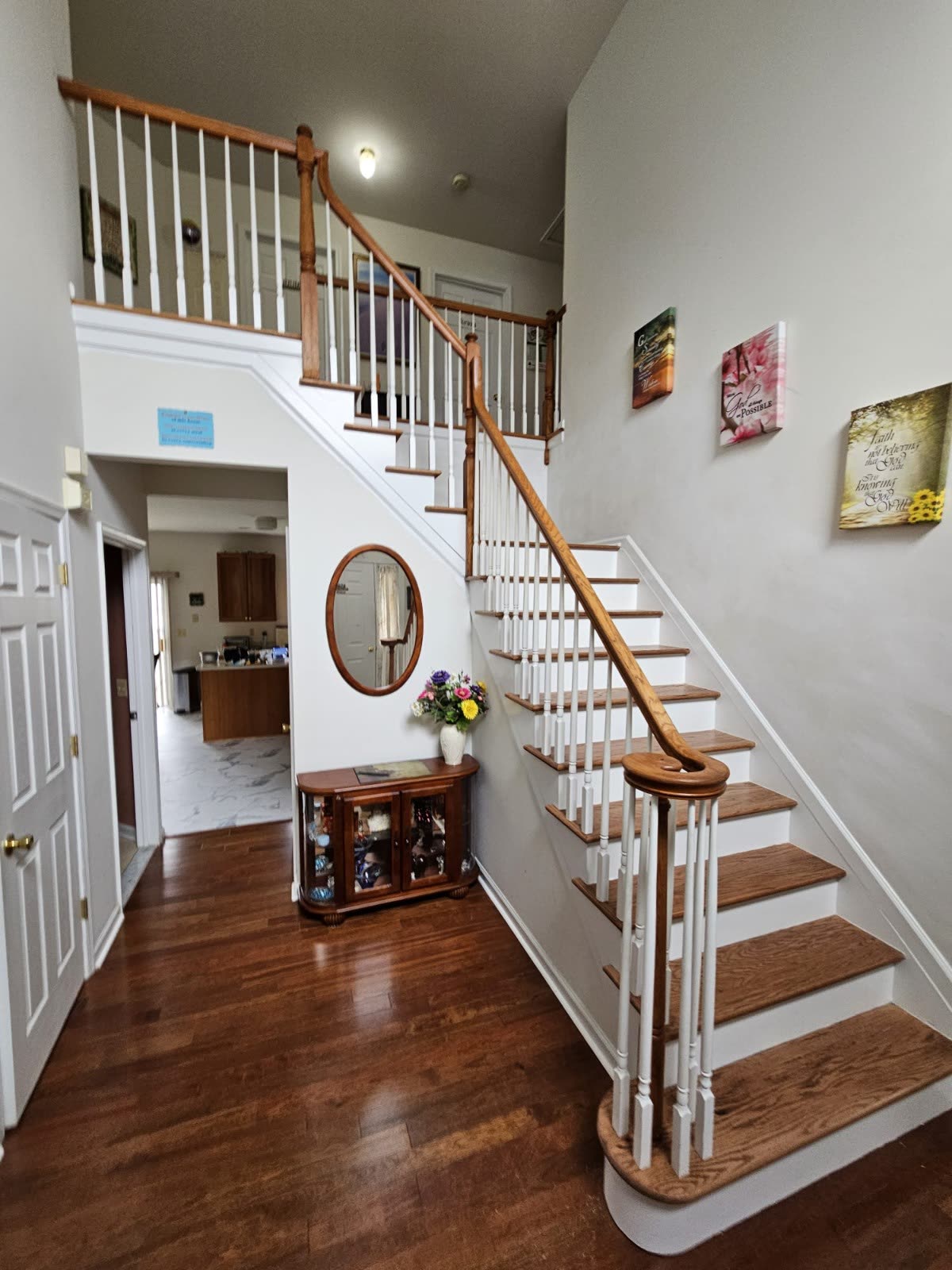 Newly finished hardwood staircase and entry flooring in an Ocean County, NJ home