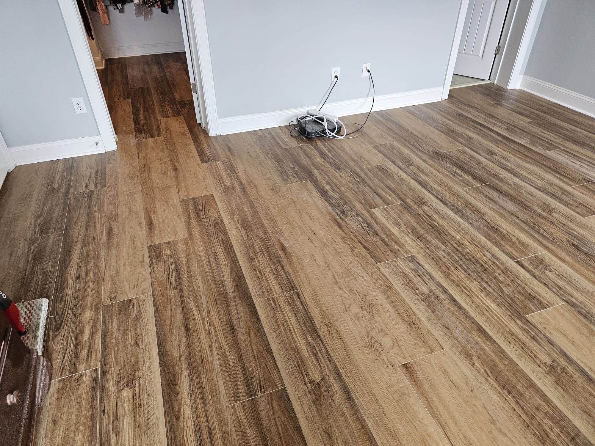Wood-look flooring installation in a Toms River, NJ living room