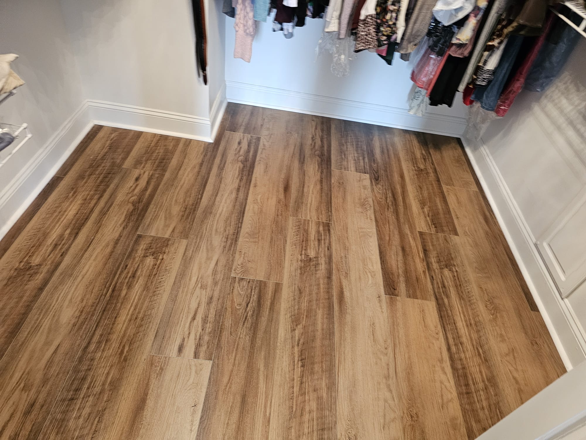 Luxury vinyl plank flooring installed in a walk-in closet in Toms River, NJ
